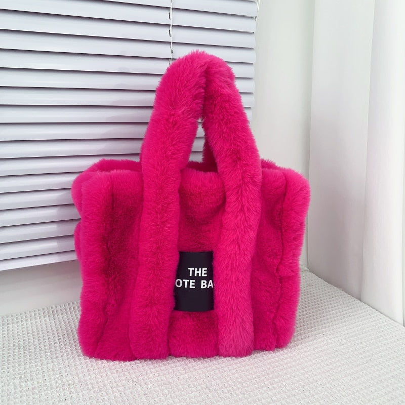 sac en bandoulière avec fausse fourrure fuchsia
