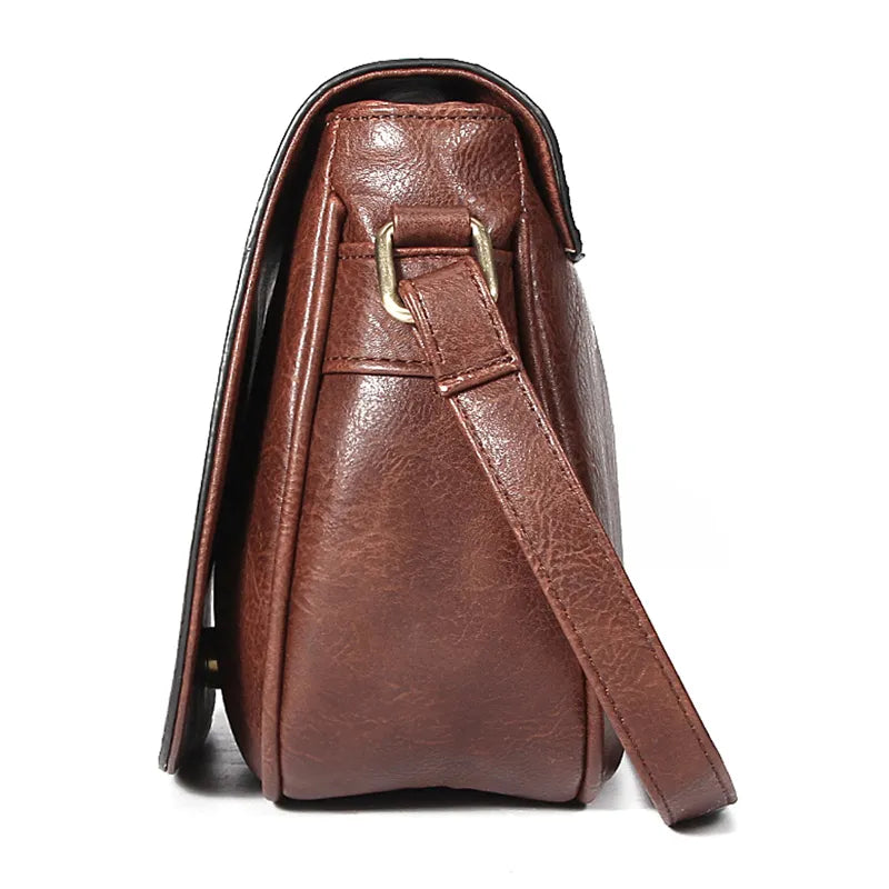 détails sac bandouliere vintage cuir