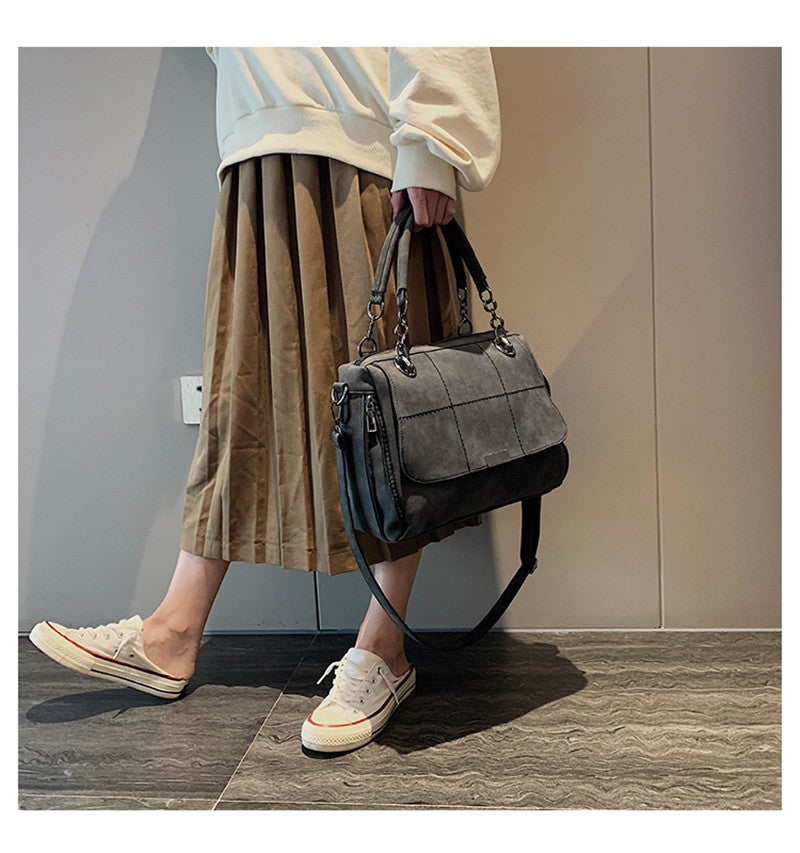 sac a main daim noir avec poignet