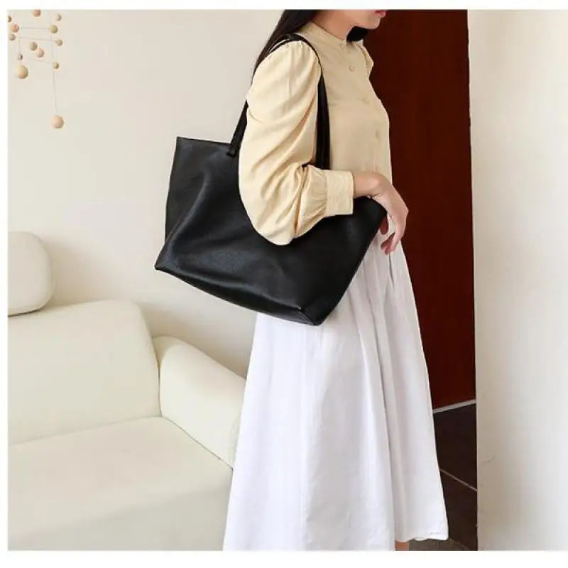 sac de cours en cuir noir