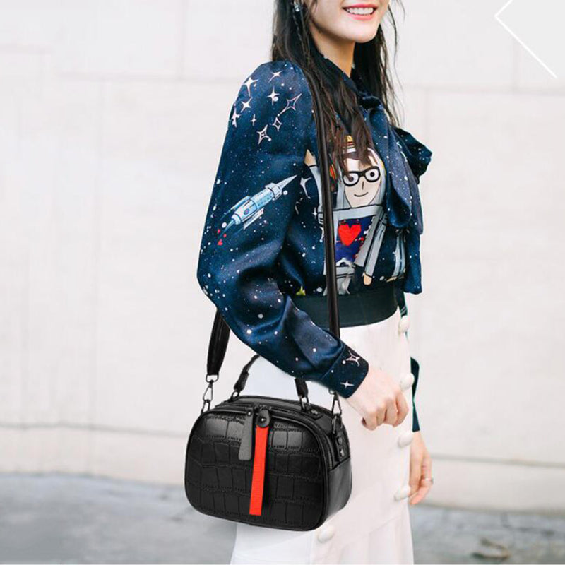 sac croco noir bandouliere porte