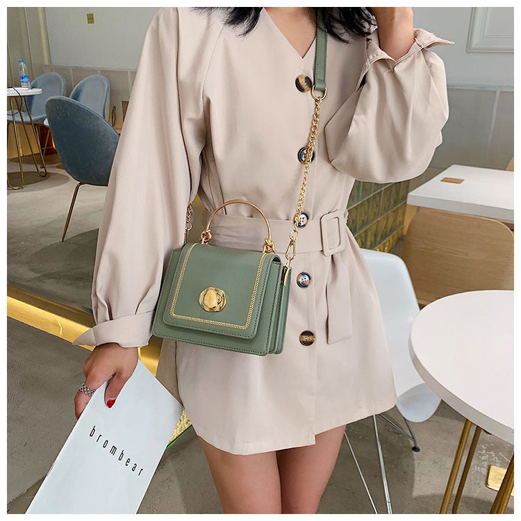 sac a main bandouliere chaine porte croise vert