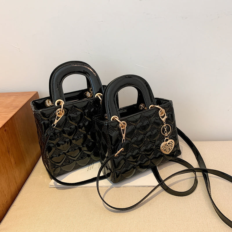 sac bandouliere noir brillant grand et petit