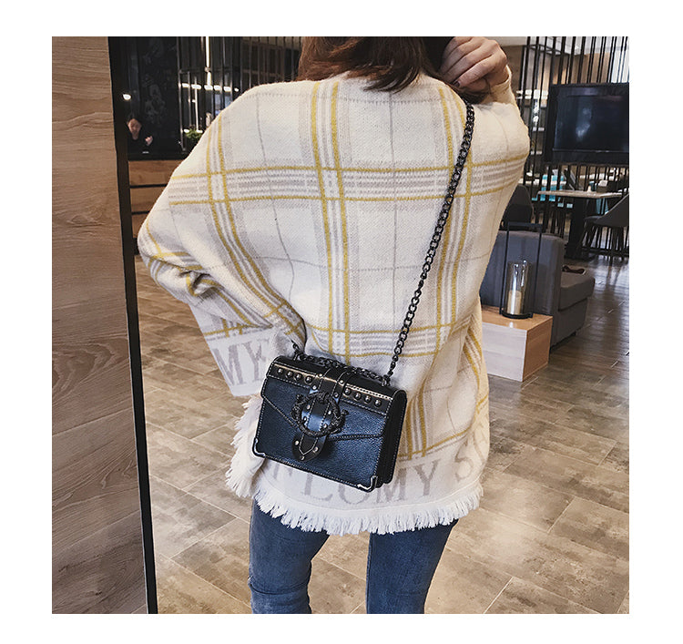 sac noir bandoulière chaine porte croise