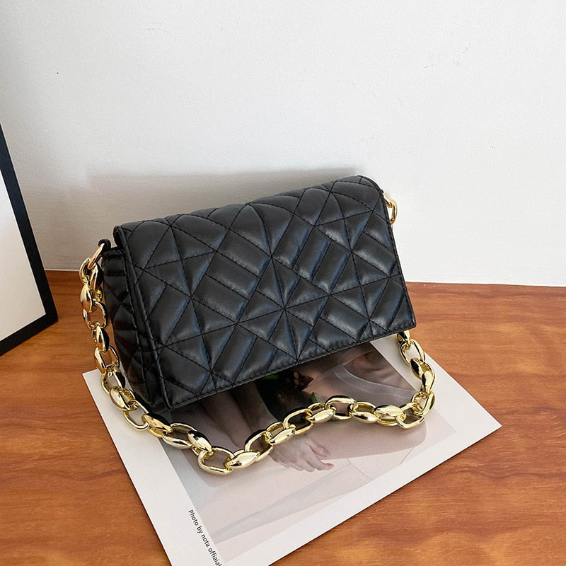 sac a main noir et doré