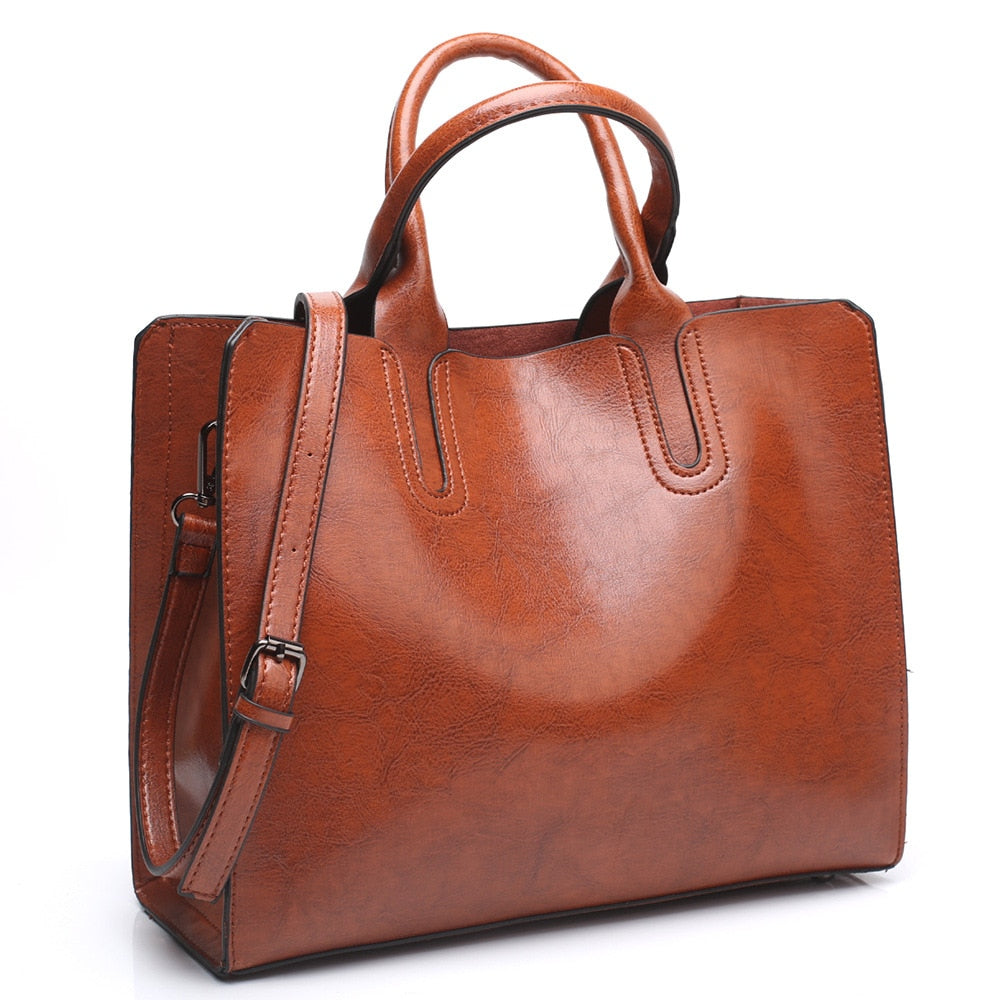 sac a main cuir marron carre avec bandouliere reglable