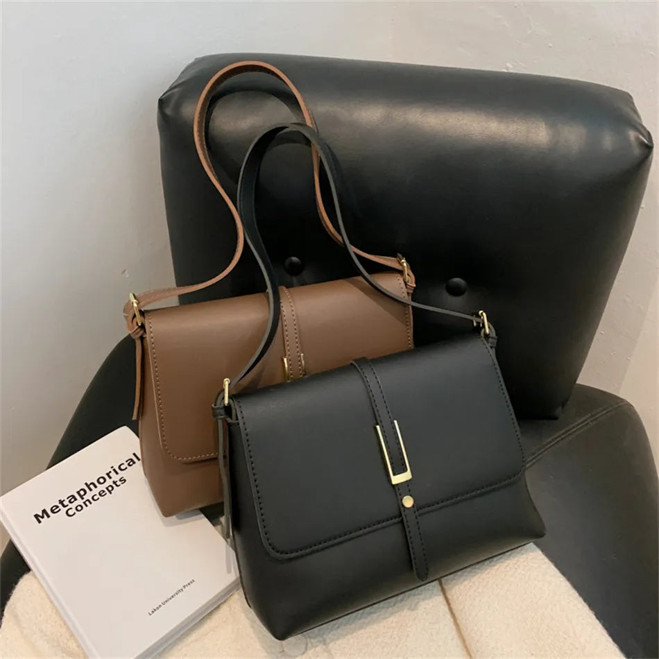 sac a main en bandouliere noir et marron