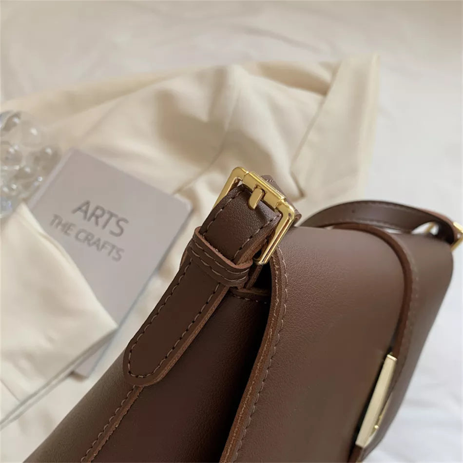 sangles dore du sac a main en bandouliere