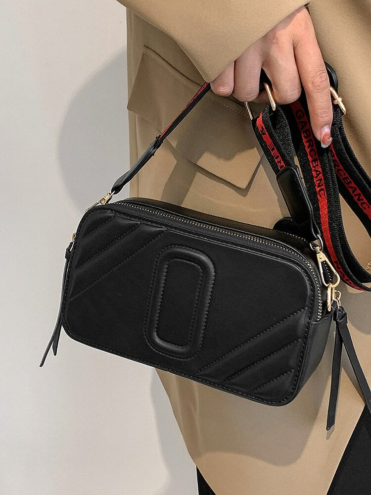 sac bandouliere noir luxe elegant