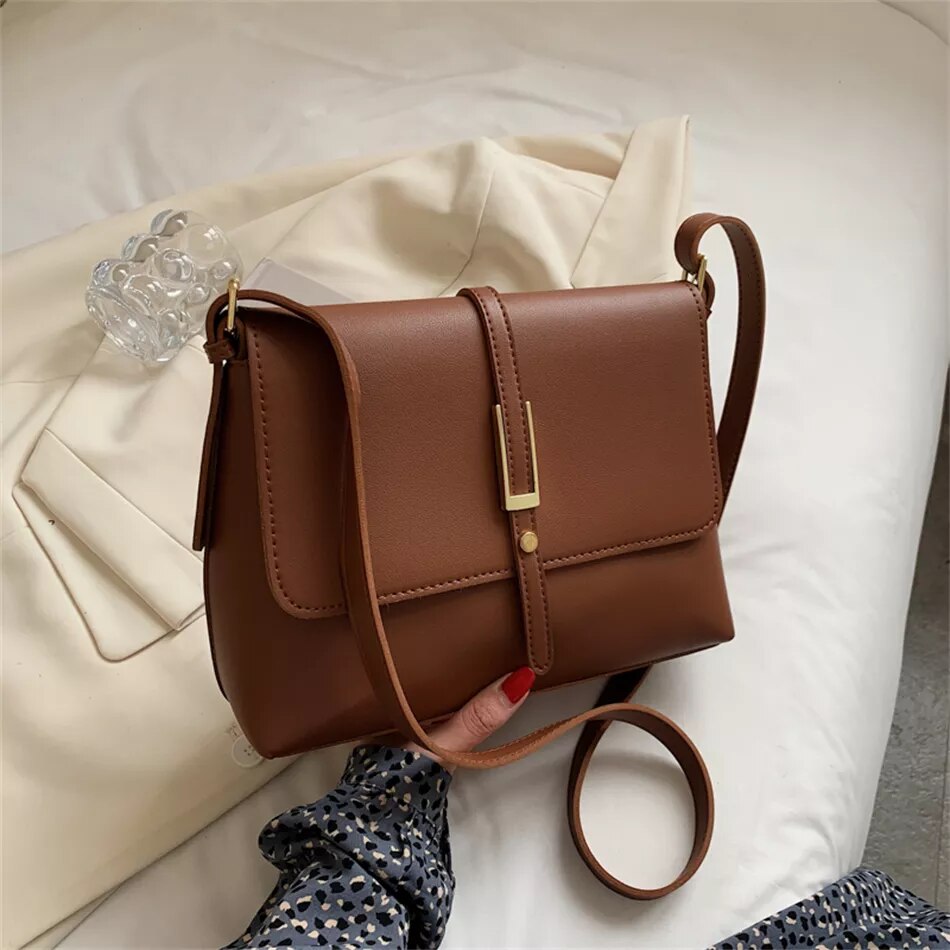 sac a main en bandouliere camel
