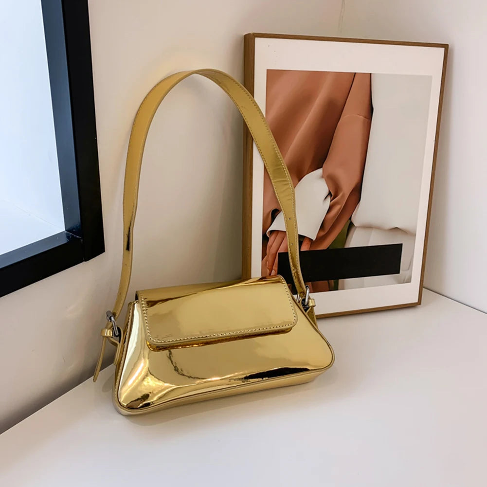 petit sac doré avec rabat