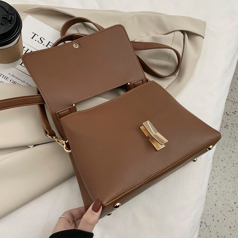 sac a main trapeze marron et or