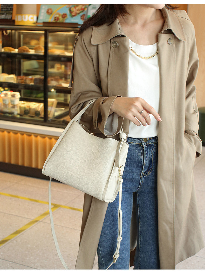 sac a main chic en cuir blanc porte a la main