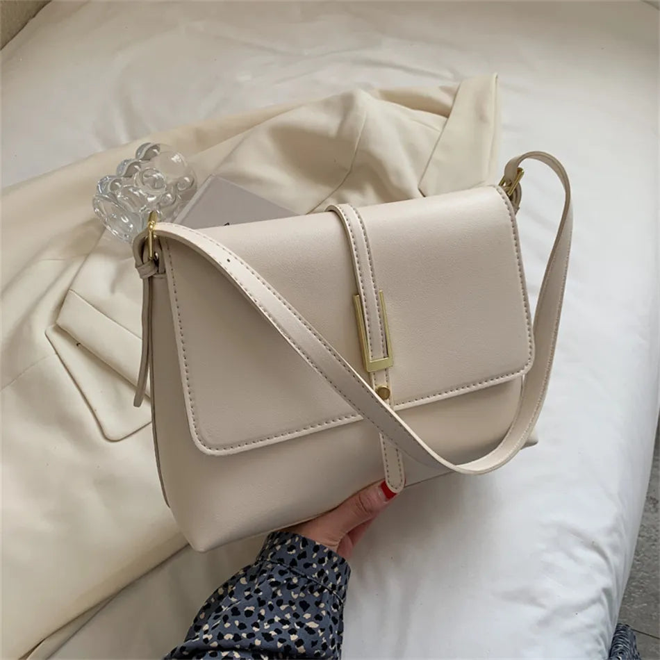 sac a main en bandouliere blanc en cuir synthétique