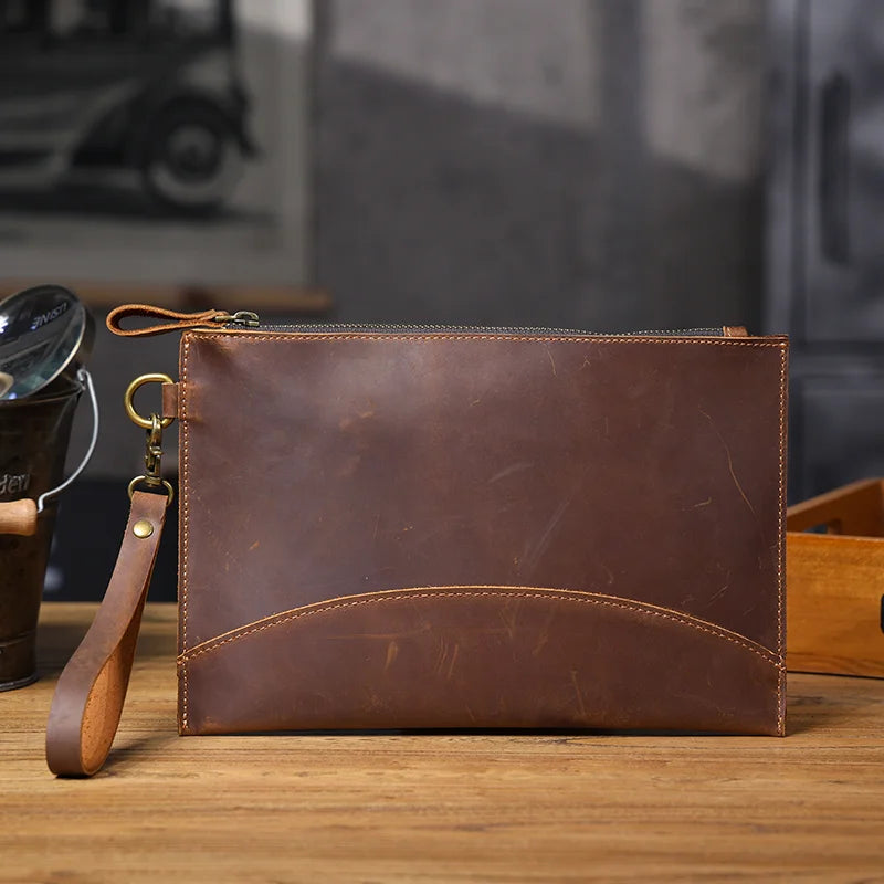pochette sac homme en cuir marron