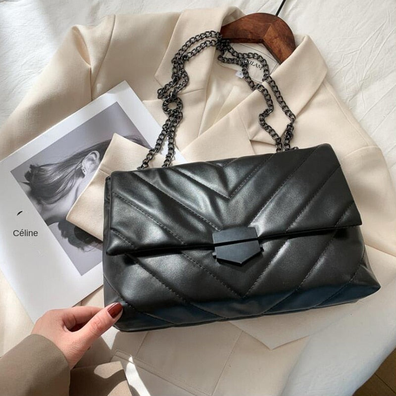 sac bandouliere noir et argent tendance