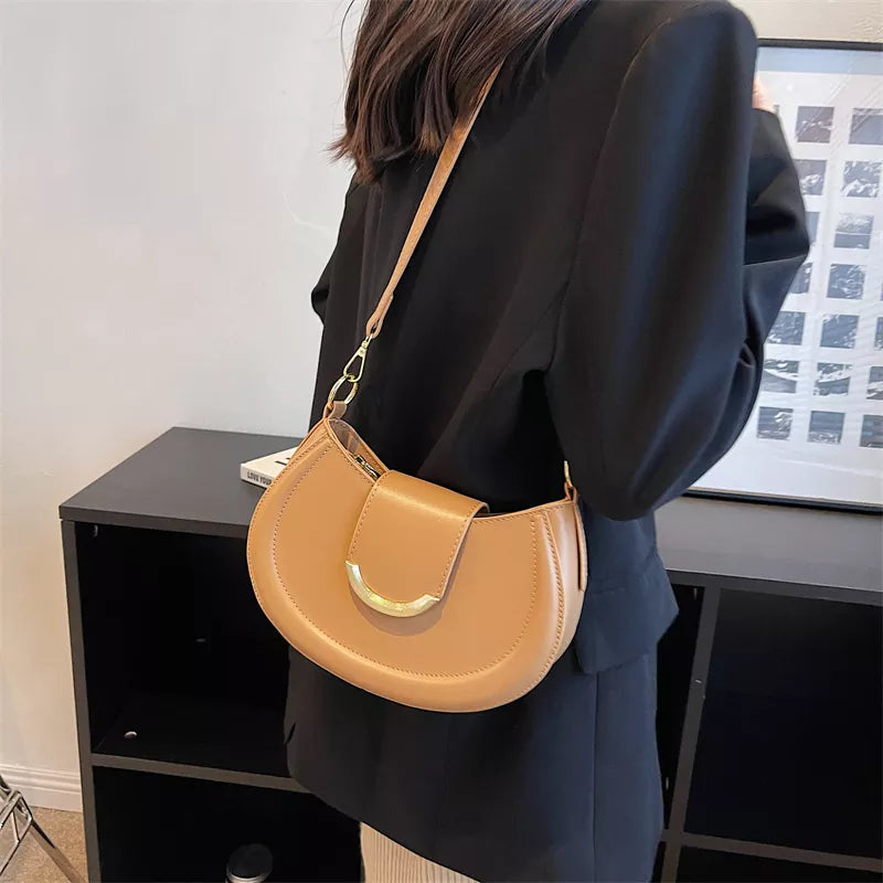 sac bandouliere beige porte a l'epaule