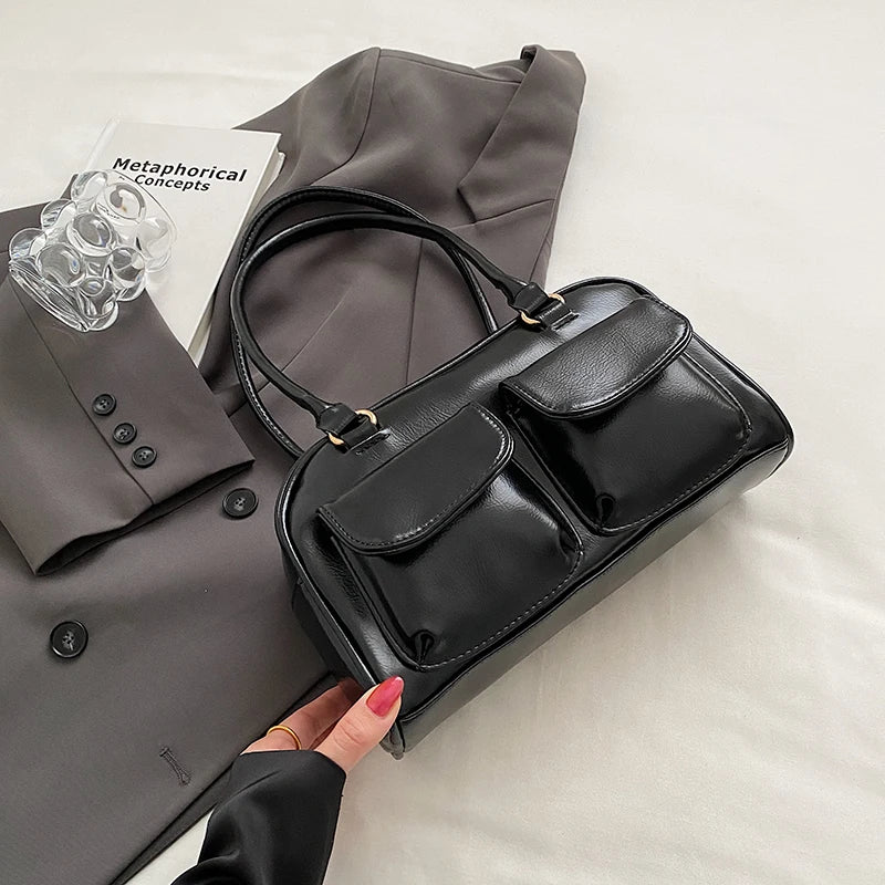 petit sac a main multipoche noir vernis