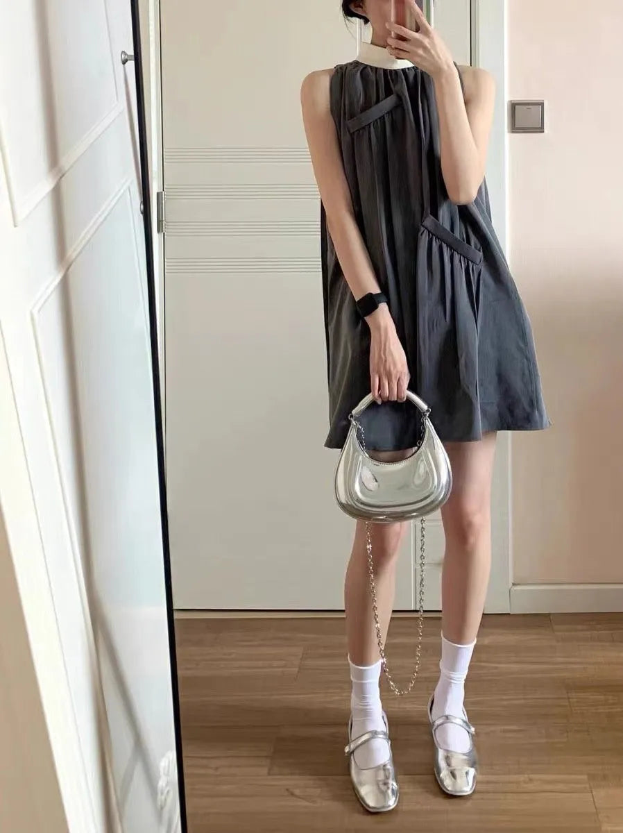 sac argenté bandouliere porté