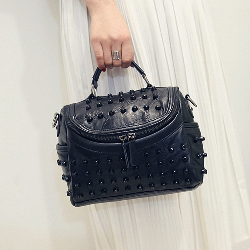 sac a main noir cloute sophistique