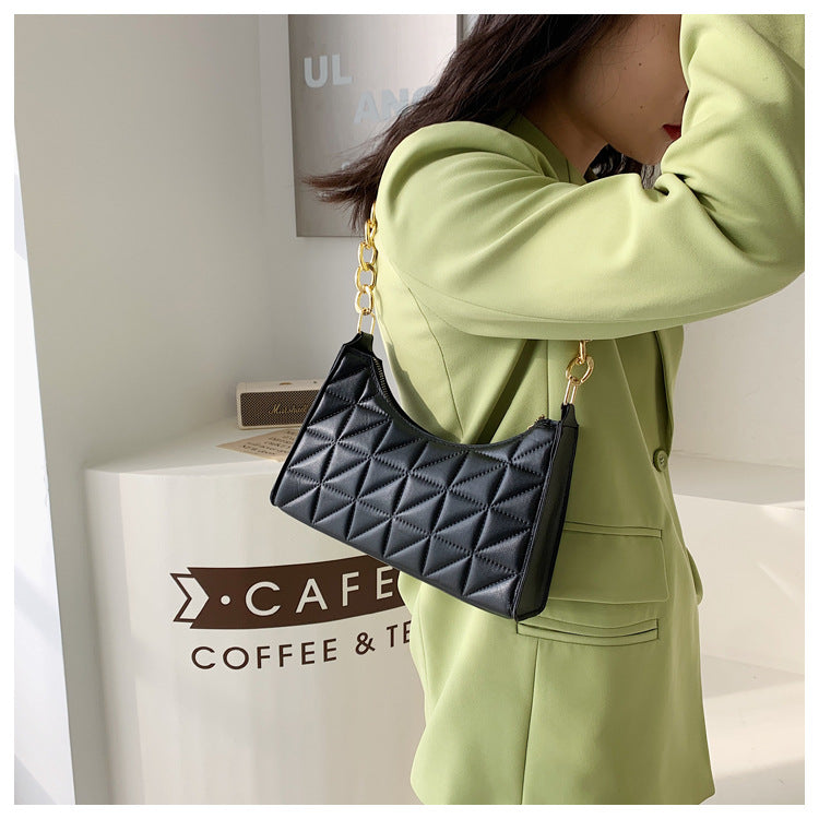 sac a main noir chaine doré matelassé