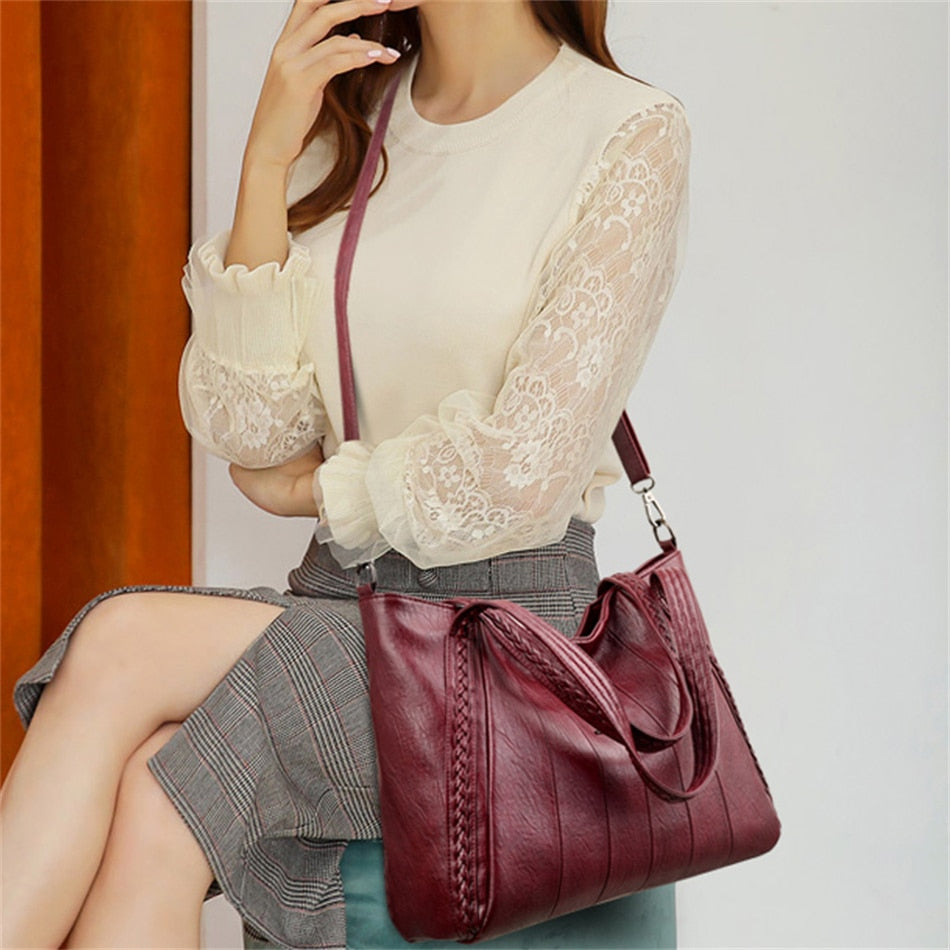 sac a main bordeaux cuir porte en bandouliere