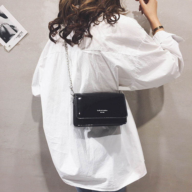 sac bandouliere noir vernis sophistiqué