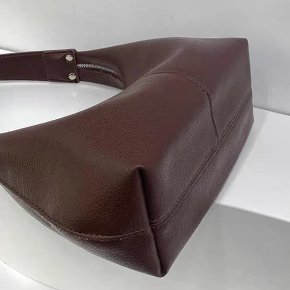 détails du petit sac porté épaule