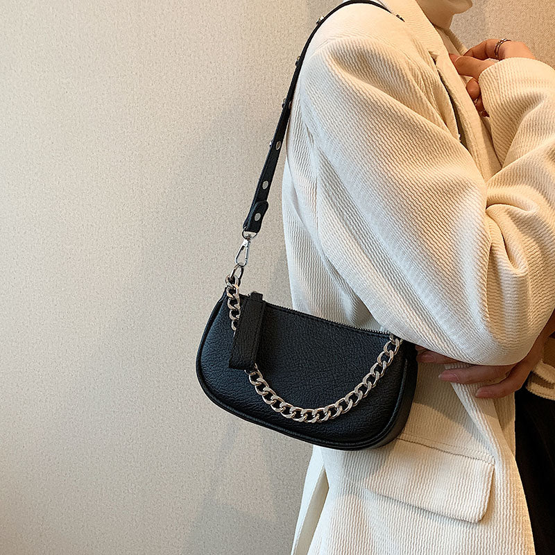sac a main noir chaine argent porte epaule
