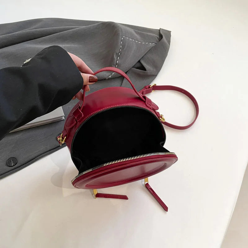 intérieur du sac bandoulière rond femme