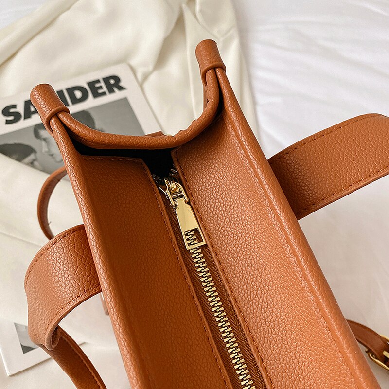 sac a main femme cuir luxe avec metal dore
