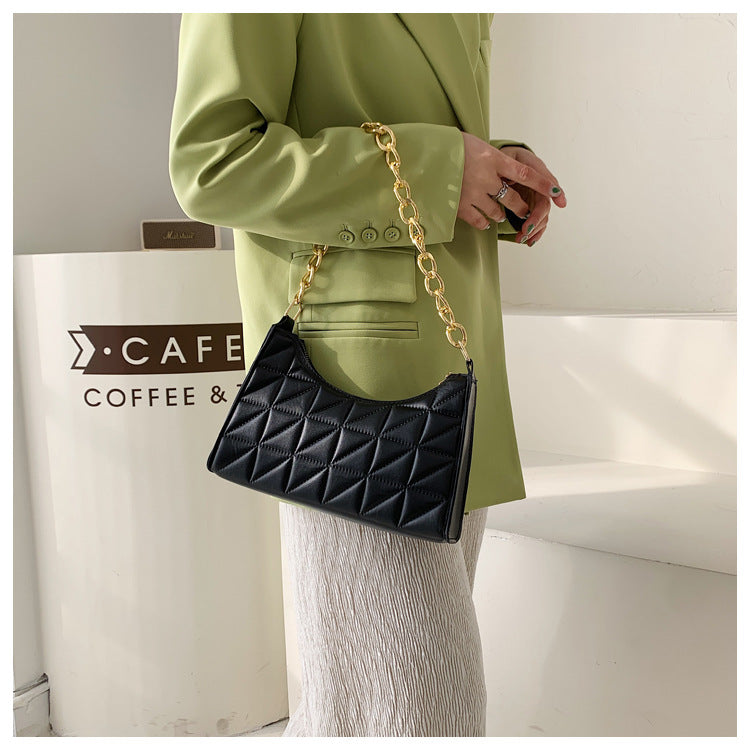 sac a main noir chaine doré porte main