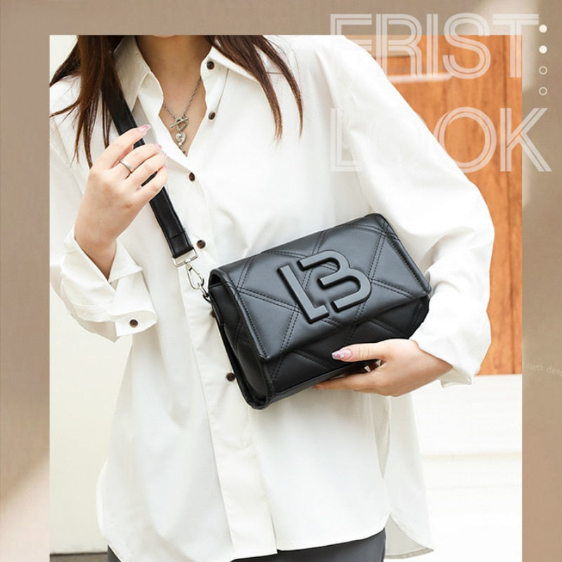 sac a bandouliere noir porte