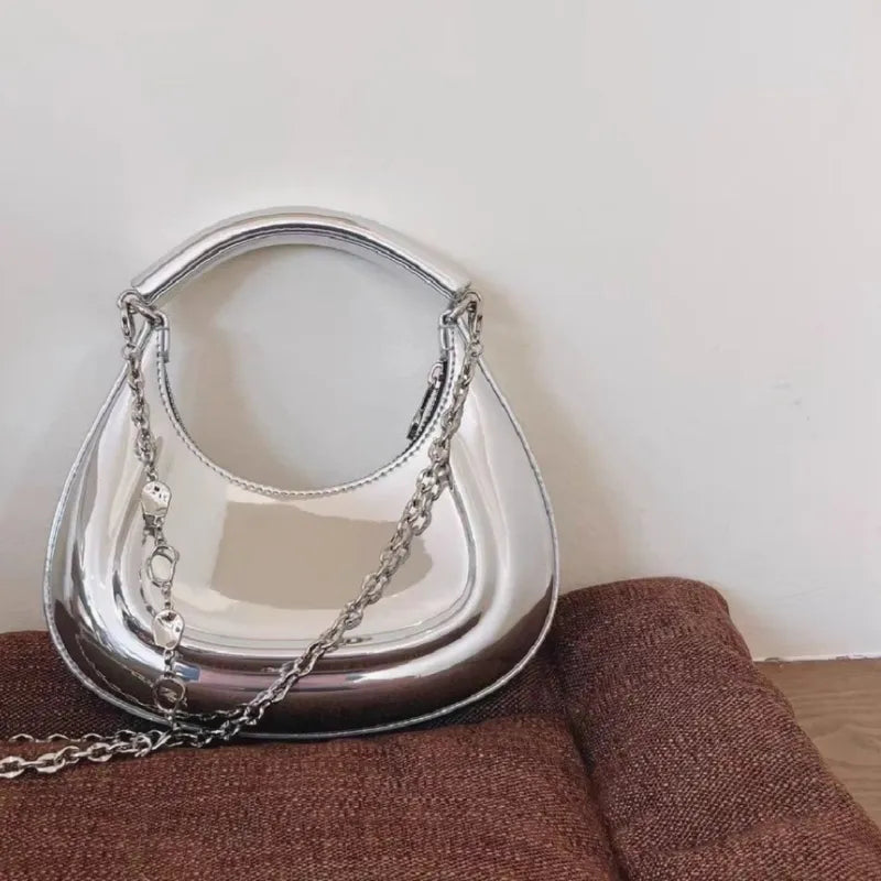 petit sac argenté bandouliere demi lune