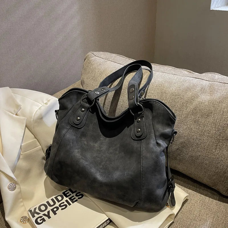 Sac à main en cuir d agneau noir multi-poches et parapluie Sac à main en cuir d agneau noir multi-poches et parapluie