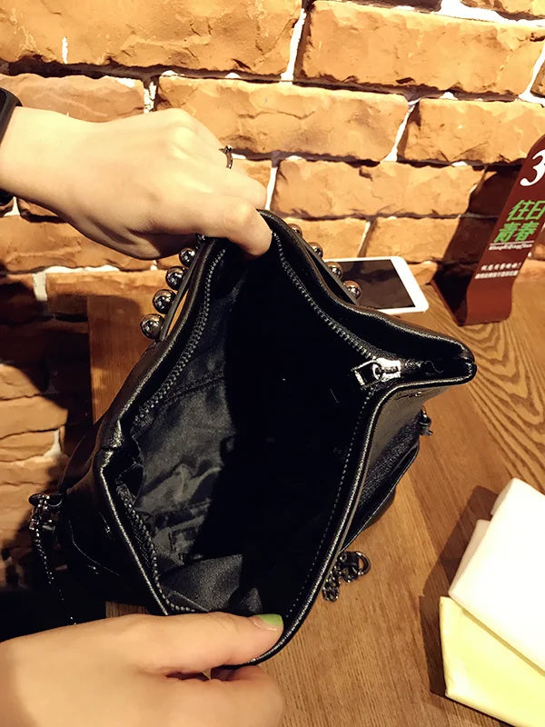 Intérieur doublé avec zip de la pochette pour femme
