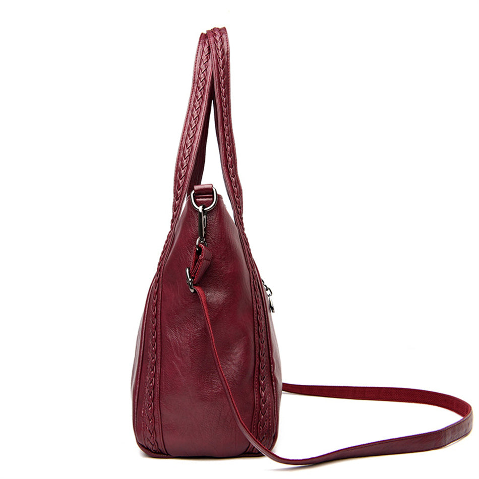 sac a main bordeaux cuir vue de cote