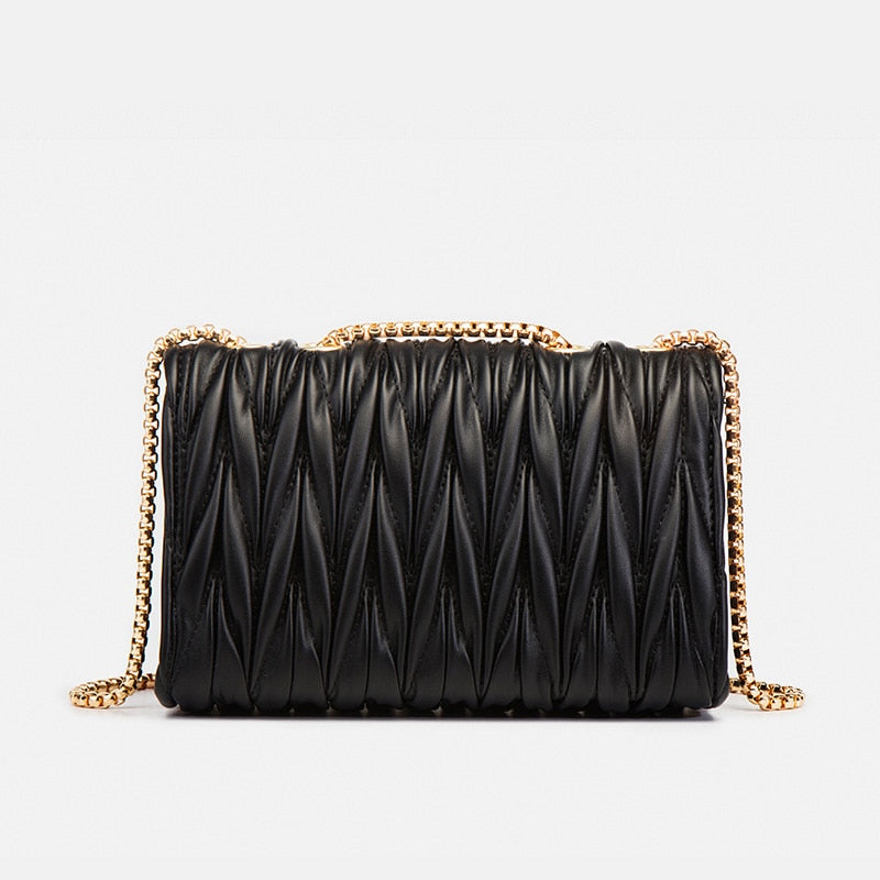 sac bandouliere noir et doré tendance