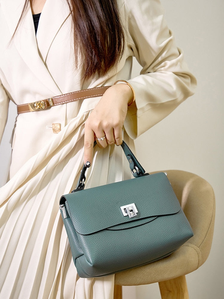 sac bandouliere en cuir graine elegant