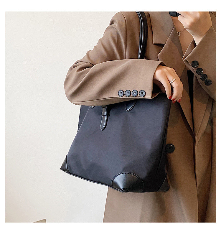sac a main impermeable noir