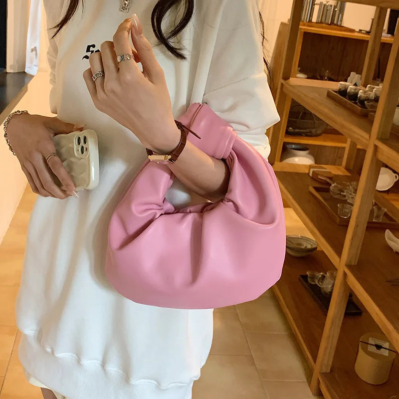 petit sac porté a la main