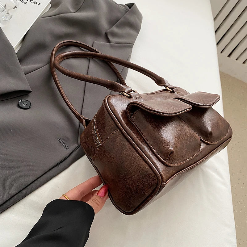 petit sac a main multipoches aspect vieilli
