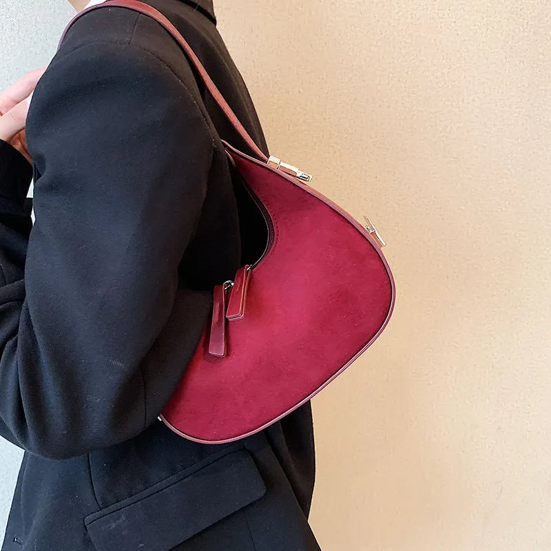 sac a main cuir et daim bordeau porte a l'epaule