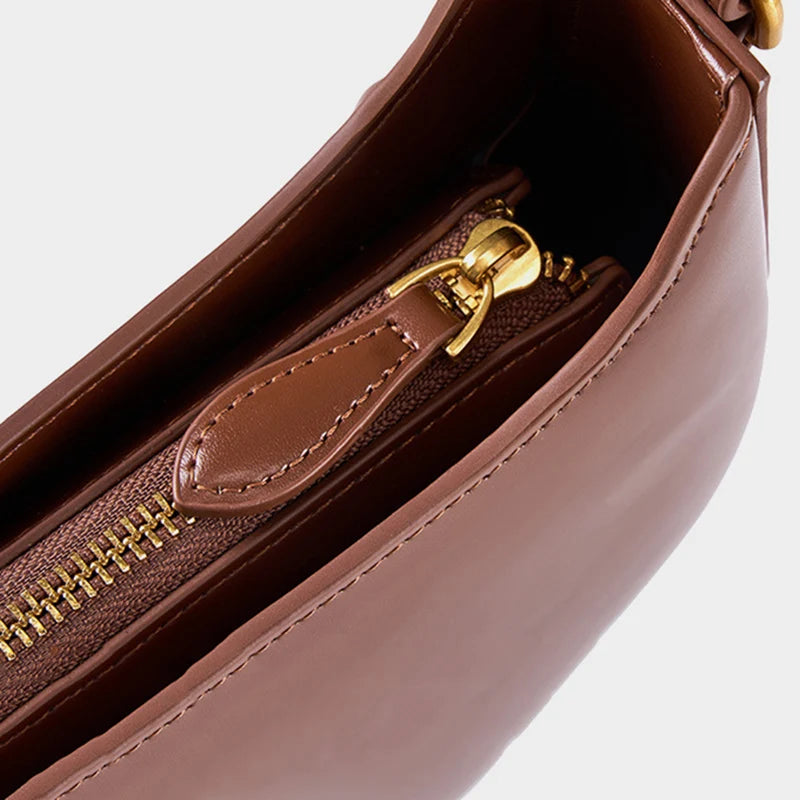 petit sac avec fermeture elcair en cuir