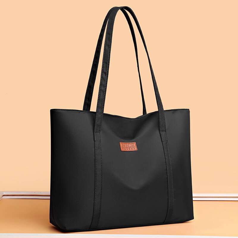 sac a main noir rectangulaire