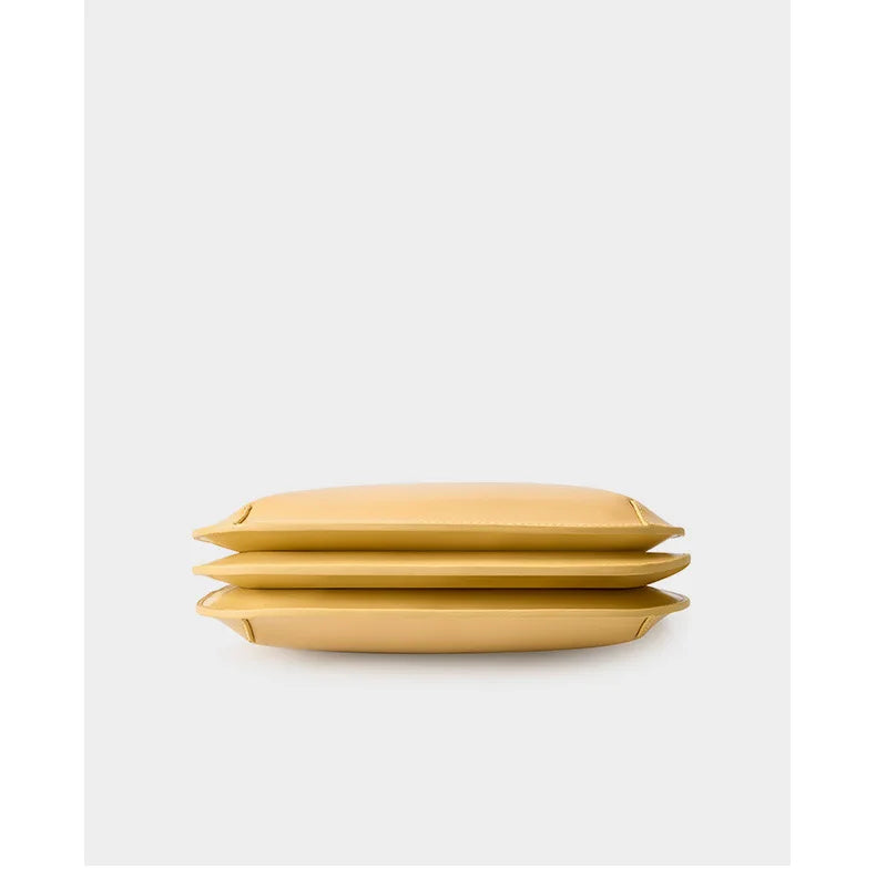 dessous du sac à main bandoulière luxe