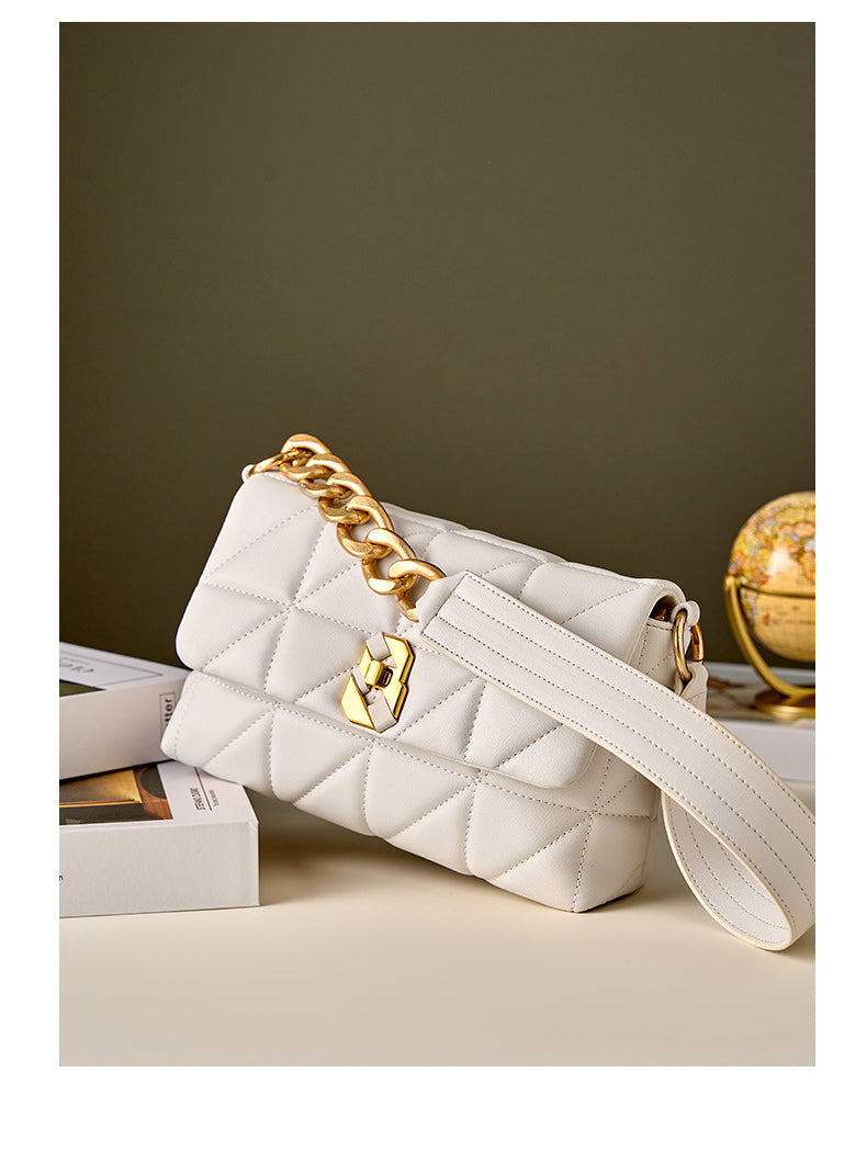 sac matelasse en cuir blanc et dore