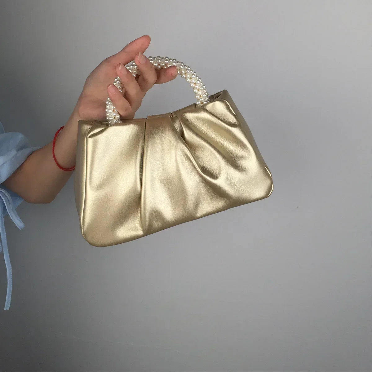 petit sac de soiree dore
