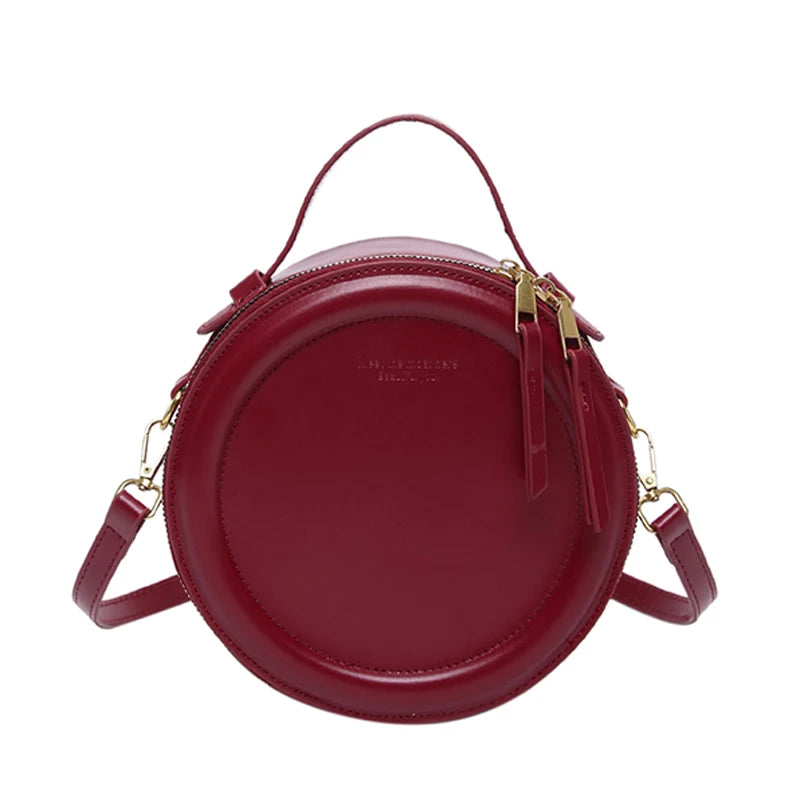 sac bandoulière rond femme rouge en cuir synthétique