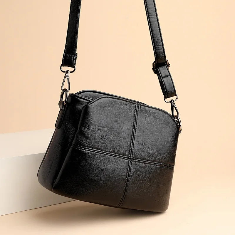 sac bandouliere femme noir en similicuir
